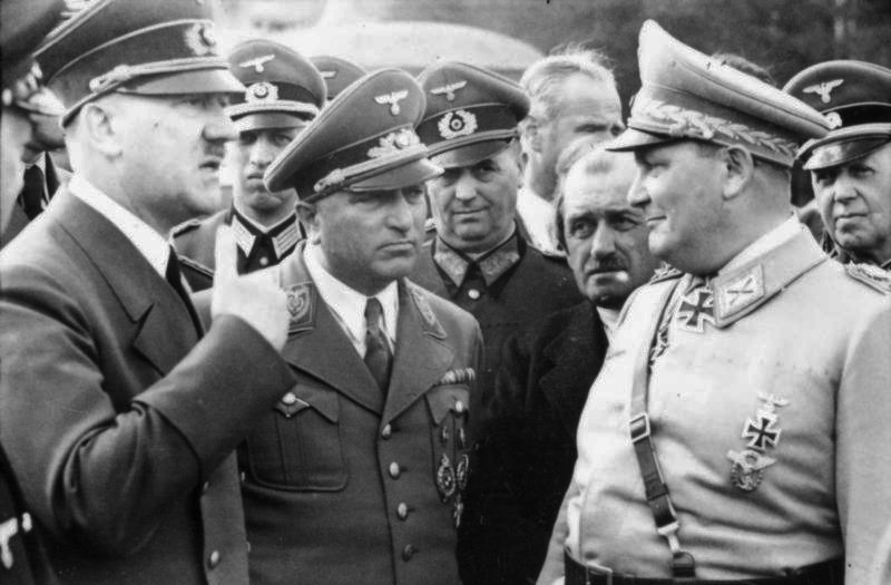 Adolf Hitler in conversation with Robert Ley, Ferdinand Porsche and Hermann Göring at FHQ Wolfsschanze